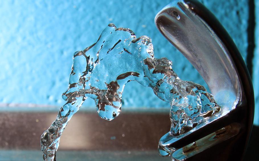 Water flows from a water fountain in Concord, N.H., on Friday, Jan. 7, 2011. 
