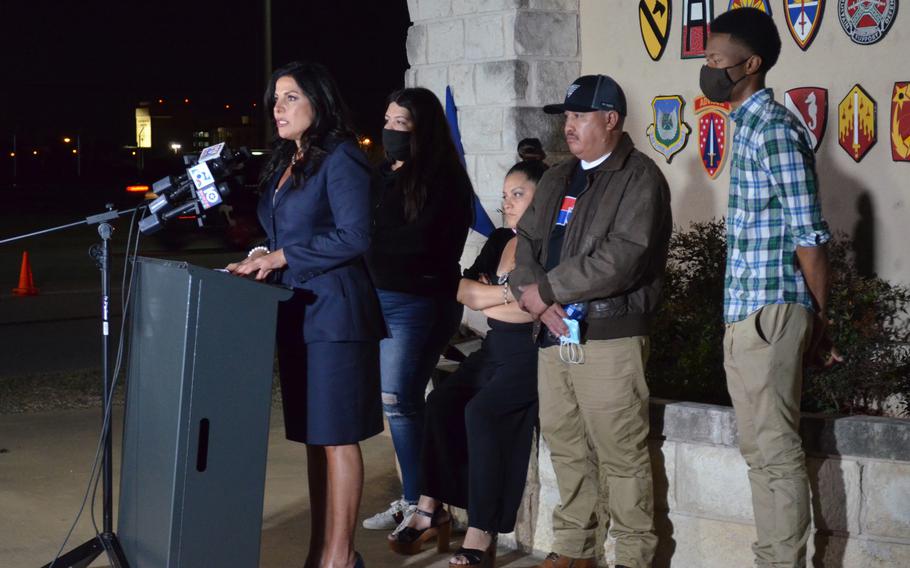 Natalie Khawam, attorney for the family of Spc. Vanessa Guillen, speaks Tuesday evening during a news conference outside the main entrance to Fort Hood, Texas. Along with Guillen’s parents, her sister and an Army friend, Khawam met with base leadership, toured several sites and visited the location of the future Guillen Gate, named in honor of the slain soldier.