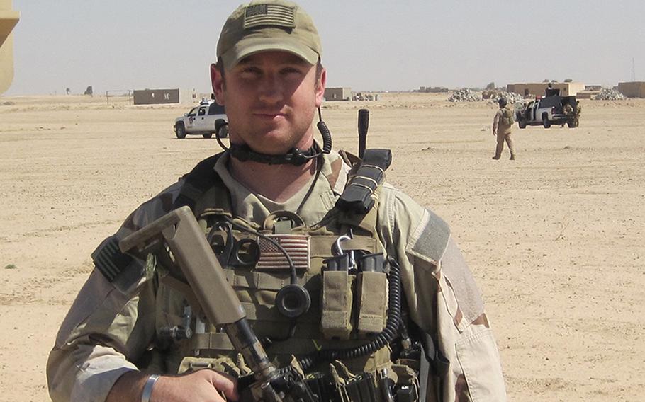 Sgt. 1st Class Rich Stayskal poses with his weapon during a deployment to Iraq in 2009. Stayskal, a Green Beret, is battling metastatic stage IV lung cancer that has spread throughout his body after military doctors failed to diagnose him for 6 months in 2017.