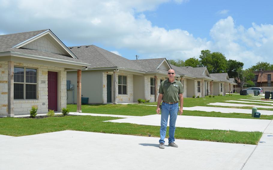 Ken Cates, director of the Fort Hood Area Habitat for Humanity, stands in the Lee A. Crossley Veterans Community in Temple, Texas, that he designed to help combat veteran homelessness. A retired Army sergeant first class, Cates estimates that once its filled, the community will reduce the area's homeless veteran population by 6%.