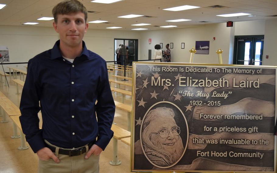 U.S. Army Sgt. Christopher Peckham, a Chinook helicopter mechanic at Hunter Army Airfield in Georgia, traveled from his home base to Fort Hood, Texas, for a ceremony to honor Elizabeth Laird, the "Hug Lady" on July 1, 2019 at Robert Gray Army Airfield at Fort Hood.