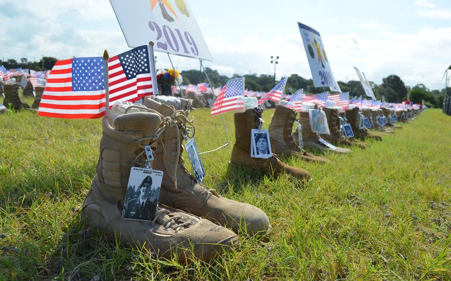 The boots representing Army Sgt. James Johnston and Army Master Sgt. Michael Riley, who died June 25 in Afghanistan, were most recently added to a display of more than 7,000 boots representing servicemembers who have died since 9/11. The display is at Fort Hood, Texas, through July 7.