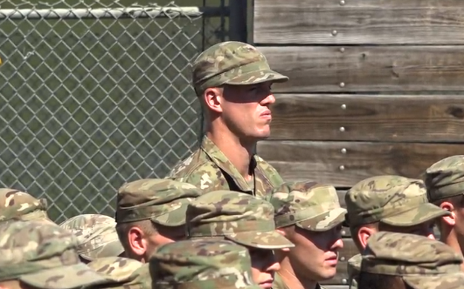 Second Lt. Marshall Plumlee, a member of Duke University’s 2015 NCAA Championship basketball team and former New York Knicks player, stands in formation in this screengrab from a video.