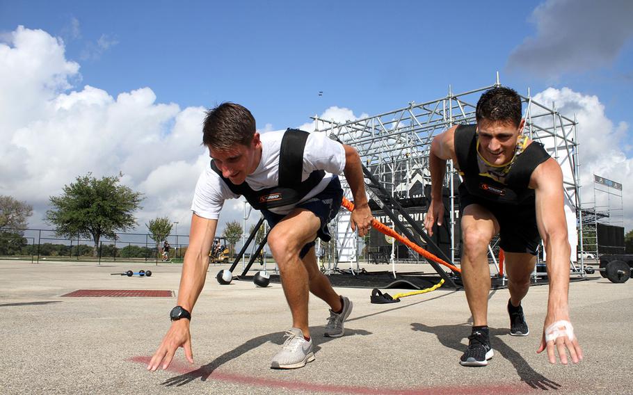 Air Force Capt. Noah Palicia, left, and Army Lt. Col. Eric Palicia, who are brothers, will compete against other members of their own service branches Thursday in the Alpha Warrior competition at Retama Park near San Antonio. If both finish within the top three of their respective branches, they will face each other Saturday in an inter-service competition.