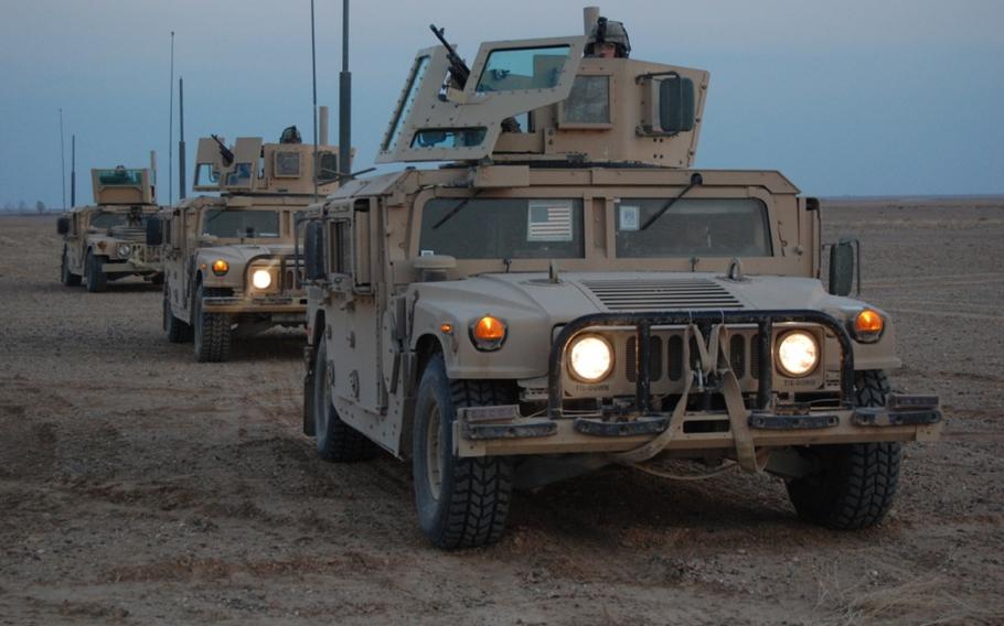 A M-1151 armored Humvee is shown during a refueling stop in Iraq. 