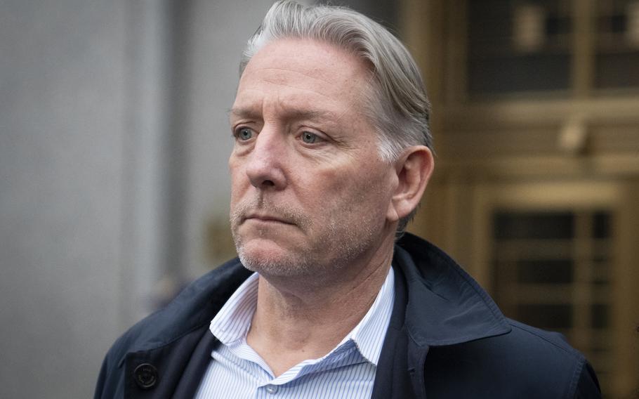 Charles McGonigal, former special agent in charge of the FBI's counterintelligence division in New York, leaves court, Monday, Jan. 23, 2023, in New York. The former high-ranking FBI counterintelligence official has been indicted on charges he helped a Russian oligarch, in violation of U.S. sanctions. 