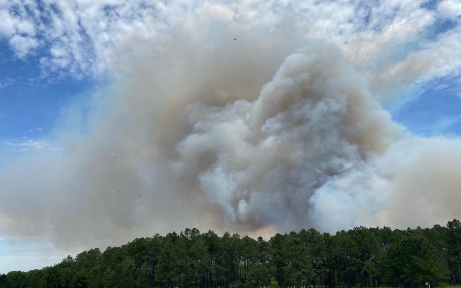 A smoke plume covers the horizon following a controlled burn, April 23 on Fort Stewart, Georgia. A large smoke plume happens from several small fires burning together quickly to form a large fire. 