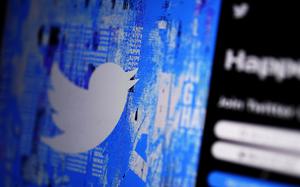 The Twitter splash page is seen on a digital device on April 25, 2022, in San Diego. Some parts of Twitter's source code, the fundamental computer code on which the social network operates, were leaked online, the social media company said in a legal filing on Sunday, March 26, 2023. 