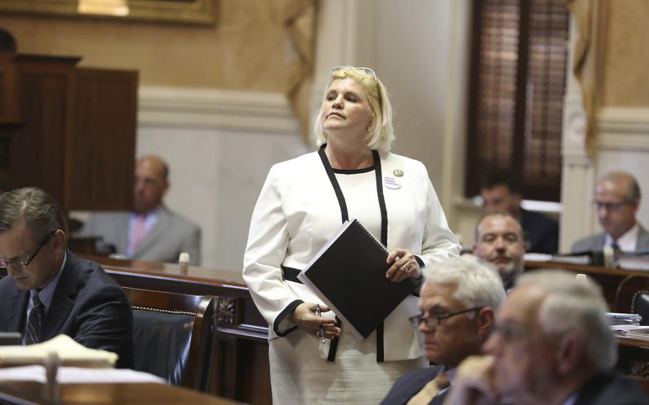 South Carolina Sen. Penry Gustafson, R-Camden, walks back to her desk after a speech during a Senate debate on whether to pass a stricter law on abortion, Tuesday, May 23, 2023, in Columbia, S.C. 