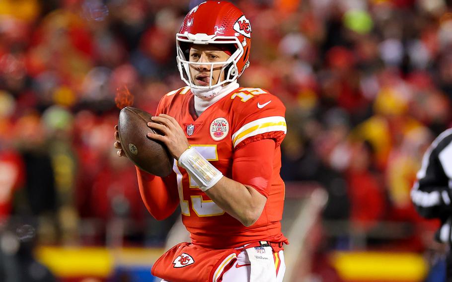 Patrick Mahomes (15) of the Kansas City Chiefs looks to pass against the Cincinnati Bengals during the third quarter in the AFC Championship Game at GEHA Field at Arrowhead Stadium on Jan. 29, 2023, in Kansas City, Missouri. 