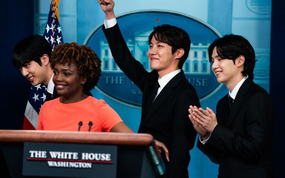 Members of the K-pop supergroup BTS join White House press secretary Karine Jean-Pierre during the daily briefing on May 31. 