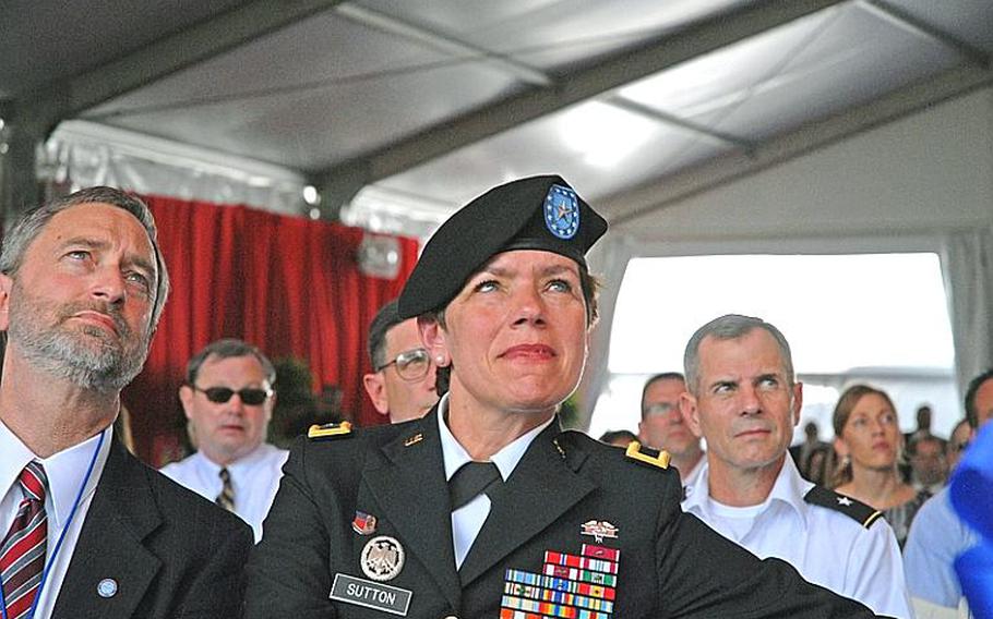Brig. Gen. Loree Sutton, who abruptly stepped down as director of the Defense Centers of Excellence amid controversy over struggling efforts to diagnose and treat traumatic brain injury and post-traumatic stress disorder, listens to the dedication ceremony of a new privately-built center for TBI and PTSD.