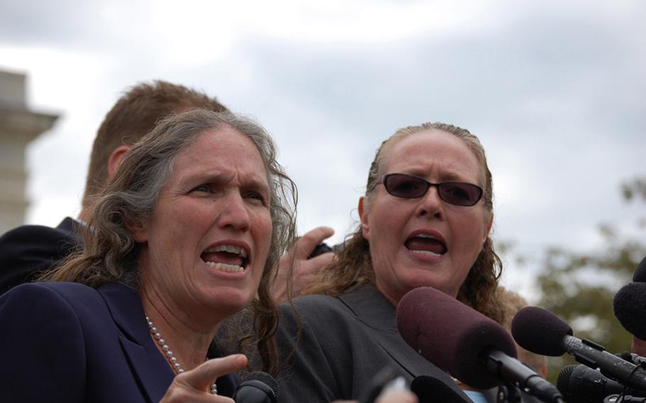 Marjie J. Phelps (right) and Shirley Phelps-Roper, members of the Westoboro Baptist Church, speak to the media following a hearing at the U.S. Supreme Court on Wednesday.
