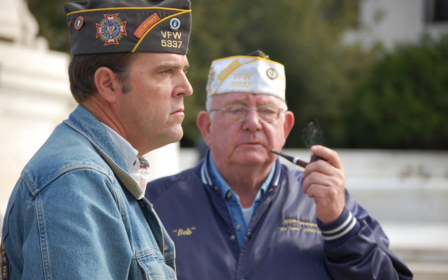 Members of  VFW Post 5337 from Maryland wait outside the U.S. Supreme Court on Wednesday. VFW members were there in support of Al Snyder, father of Marine Lance Cpl. Matthew Snyder, died in Iraq in 2006. He sued the Westboro Baptist Church after it picketed his son's funeral with signs that read 'God hates you' and 'Semper Fi fags.'