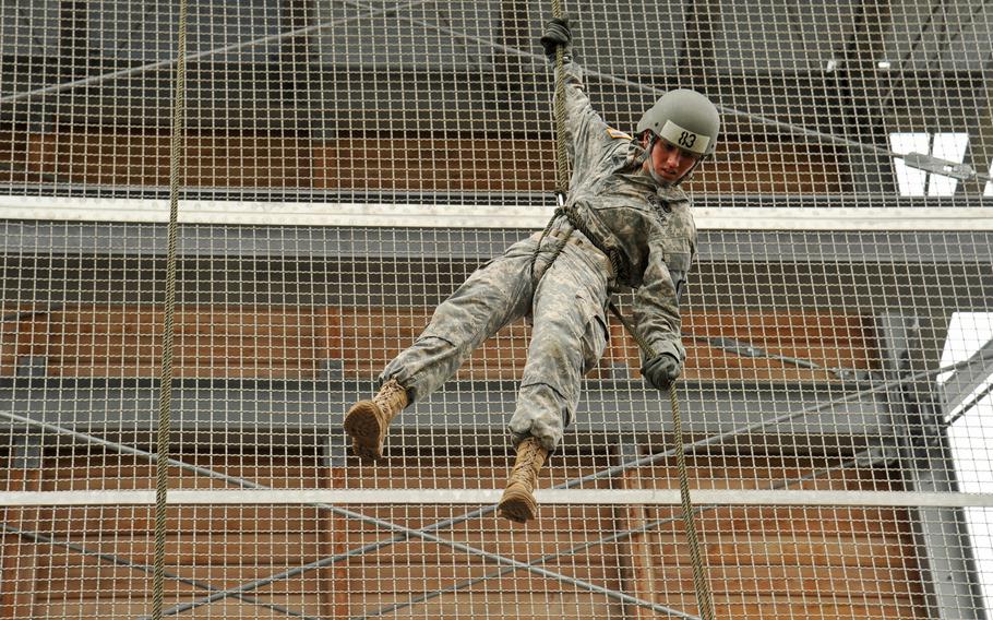 Sgt. Samantha Melanson, assigned to 15th Engineer Battalion, rappels from a 55-foot tower during an air assault course at the 7th Army Joint Multinational Training Command's Grafenwoehr Training Area, Germany, June 8, 2015.