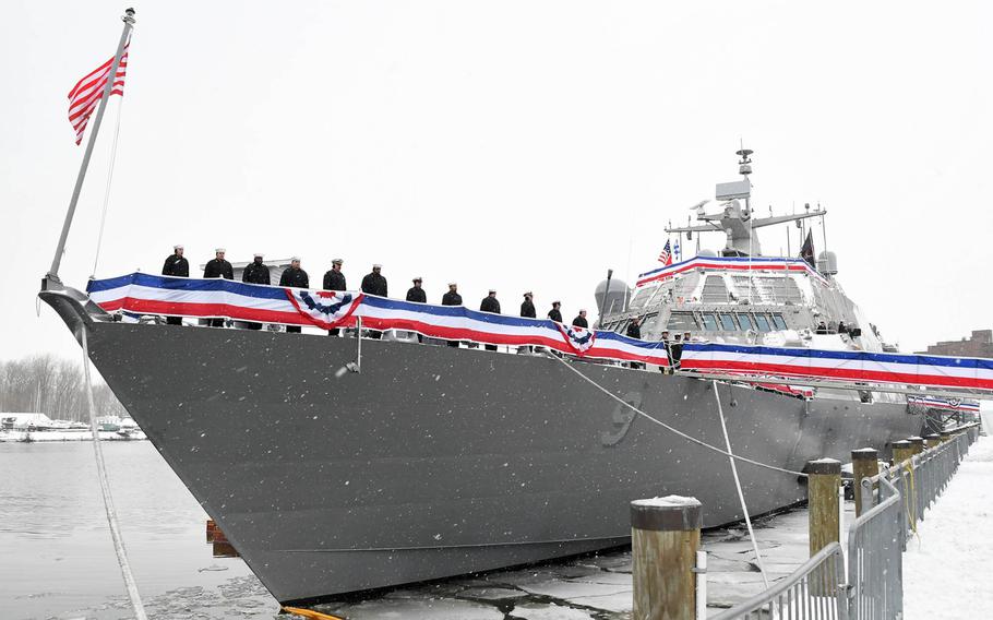 Sailors man the rails of the littoral combat ship USS Little Rock during its December commissioning ceremony in Buffalo, N.Y.