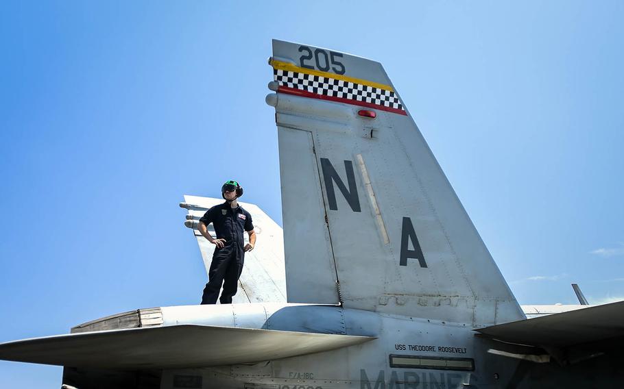 Cpl. Dylan Lippard observes a replenishment-at-sea last month from atop an F/A-18C Hornet on the flight deck of the aircraft carrier USS Theodore Roosevelt.