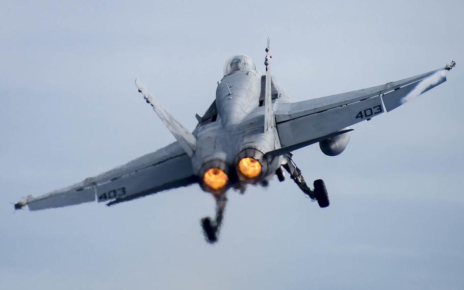 An F/A-18C Hornet takes off earlier this year from the aircraft carrier USS Carl Vinson in the Pacific Ocean.
