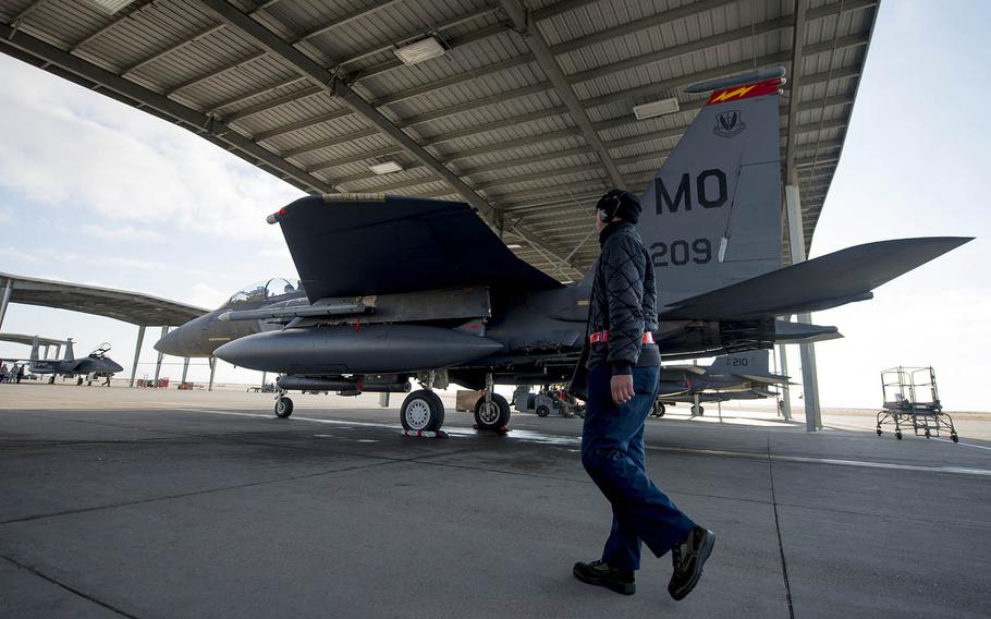 Senior Airman Zachary Dobsch, 366th Aircraft Maintenance Squadron crew chief, inspects an F-15E Strike Eagle in December at Mountain Home Air Force Base, Idaho.