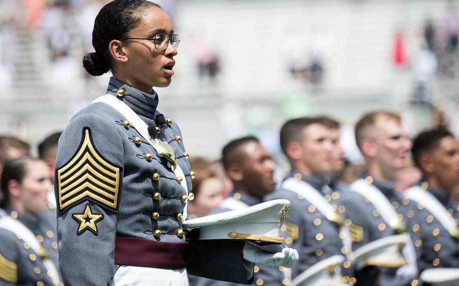 Simone Askew, first captain of the U.S. Military Academy's Corps of Cadets, sings the alma mater during her graduation ceremony, May 26, 2018.