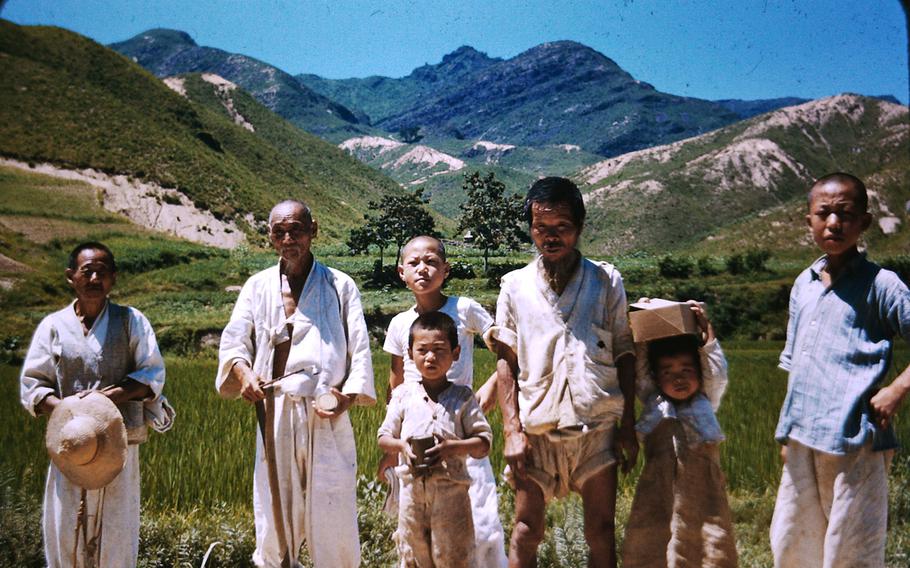 South Koreans pose in the countryside in 1952 during the Korean War.