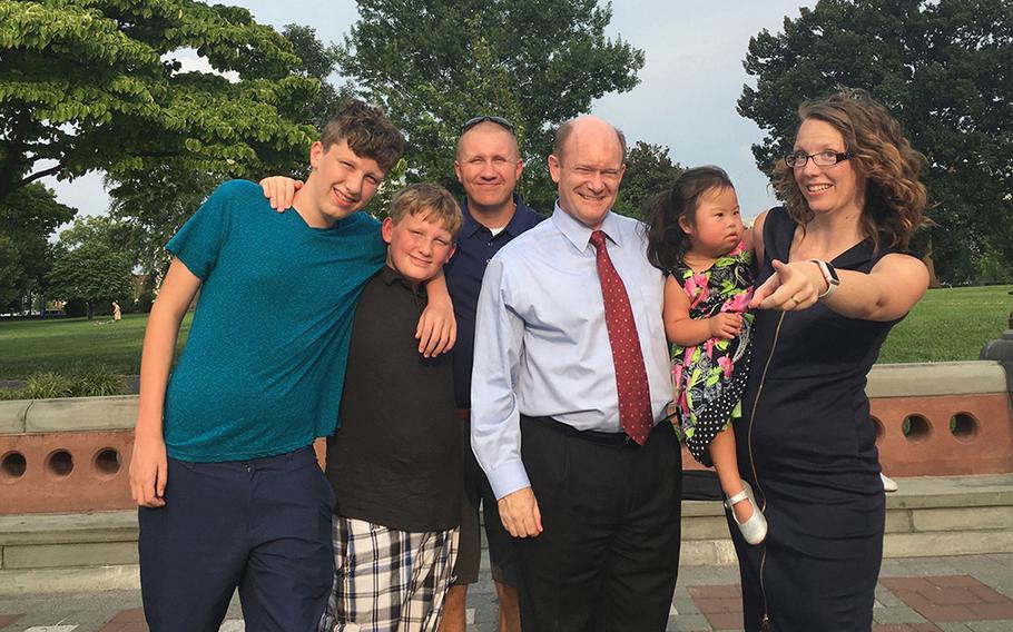 The Carrigg family poses with Sen. Chris Coons, D-Delaware, in July 2017 on Capitol Hill. Army 1st Sgt. Joshua Carrigg and his wife Austin were among dozens of special needs families to file a complaint that the military failed them after care to their sick children was denied. From left: Christian and Nickolas Carrigg, their father Joshua Carrigg, Coons, Melanie and Austin Carrigg.
