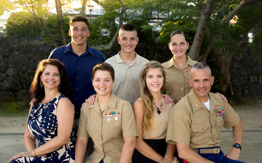 Marine Maj. Lyle Gilbert, bottom right, and his wife Johanna, bottom left, have four children serving on active duty in the U.S. military. Three are in the Marine Corps and one is in the Air Force.