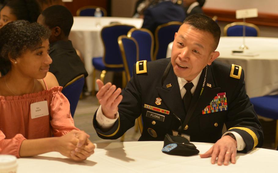 Brig. Gen. Lapthe Flora talks to high school students about his migration from South Vietnam to the United States, Feb. 9, 2018, in Washington., D.C.