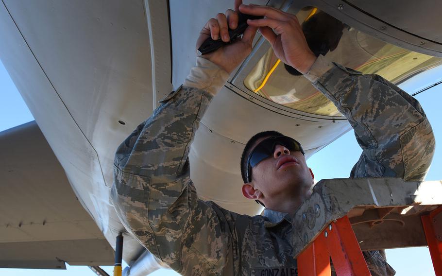 U.S. Air Force Airman 1st Class Richard Gonzales, a KC-135 crew chief with the 22nd Expeditionary Aircraft Maintenance Unit, replaces a boom sighting window at Incirlik Air Base, Turkey, Nov. 15, 2018.