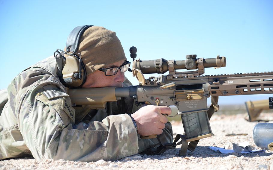 Sgt. Marc Rittikaidachar, assigned to 6th Squadron, 1st Cavalry Regiment, 1st Stryker Brigade Combat Team, 1st Armored Division, fires the newly developed Squad Designated Marksman Rifle, or SDM-R, at Fort Bliss, Texas, on Jan. 25. The brigade was selected by U.S. Army Forces Command to be the first to field the weapon. 