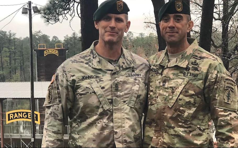 This screenshot from a Jan. 30, 2019, U.S. Army video shows Master Sgt. Jole Alvarez (right) of 1st Special Forces Group (Airborne) posing for a photo with a fellow Green Beret after Alvarez, 42, completed Ranger School at Fort Benning, Ga., in December 2018.