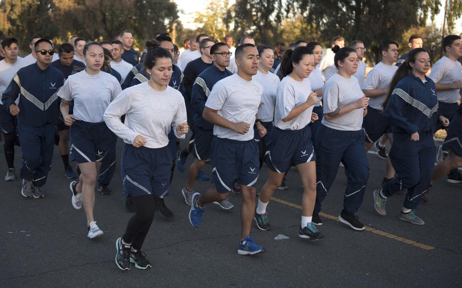 Airmen assigned to the 60th Mission Support Group participate in a group run at Travis Air Force Base, Calif., in September, 2018.