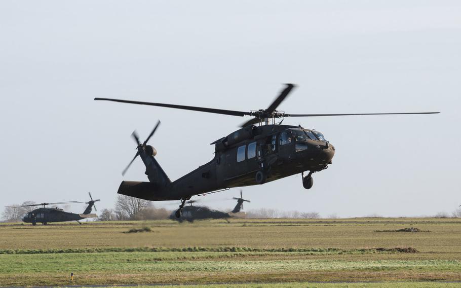 A U.S. Army UH-60 Black Hawk helicopter from the 1st Combat Aviation Brigade, 1st Infantry Division, lands for final staging before taking off from Chievres Air Base, Belgium, Feb. 7, 2019. The Army wants to boost flight pay and award pilots with incentive money for career achievements to stem a historic attrition rate in its aviation community.