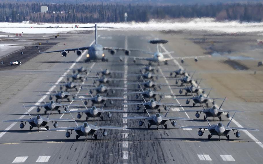 F-22 Raptors from the 3rd Wing and 477th Fighter Group participate in a close formation taxi with an E-3 Sentry and a C-17 Globemaster III, March 26, 2019, during a Polar Force exercise at Joint Base Elmendorf-Richardson, Alaska. The U.S. boosted military spending last year for the first time since 2010, with a 4.6% annual increase that added up to $649 billion.