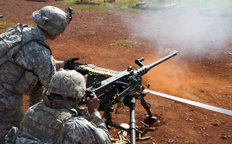 Soldiers fire an M2 Browning .50-caliber machine gun in April 2016 at the range at Schofield Barracks, Hawaii.