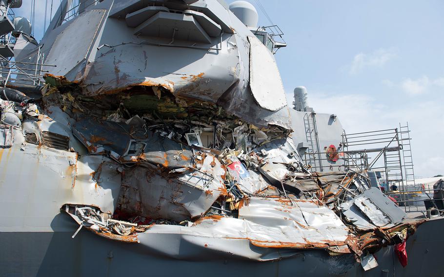 The USS Fitzgerald sits in dry dock at Yokosuka Naval Base, Japan, nearly a month after it was damaged in a deadly collision with a merchant vessel on June 17, 2017.