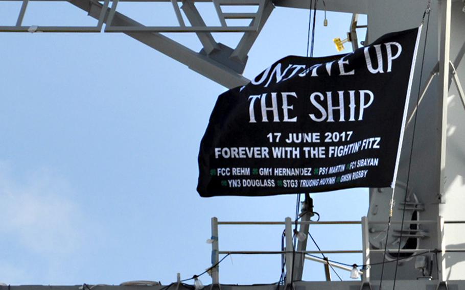 The crew of the guided-missile destroyer USS Fitzgerald has unveiled a commemorative flag honoring the seven sailors who died in a collision with a merchant ship on June 17, 2017.
