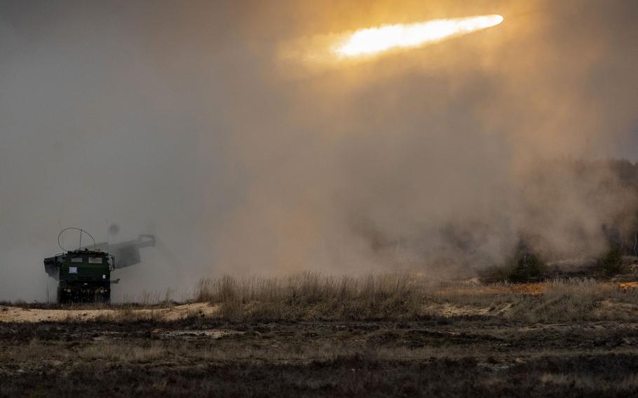 U.S. Marines with the 14th Marine Regiment, 4th Marine Division, launch rockets from a High Mobility Artillery Rocket System during live-fire training at Adazi Training Area, Latvia, March 7, 2019. A defense bill passed by lawmakers wants the Pentagon to examine how to better reinforce the Baltics with more air defenses, troop rotations and other measures aimed at countering Russia.