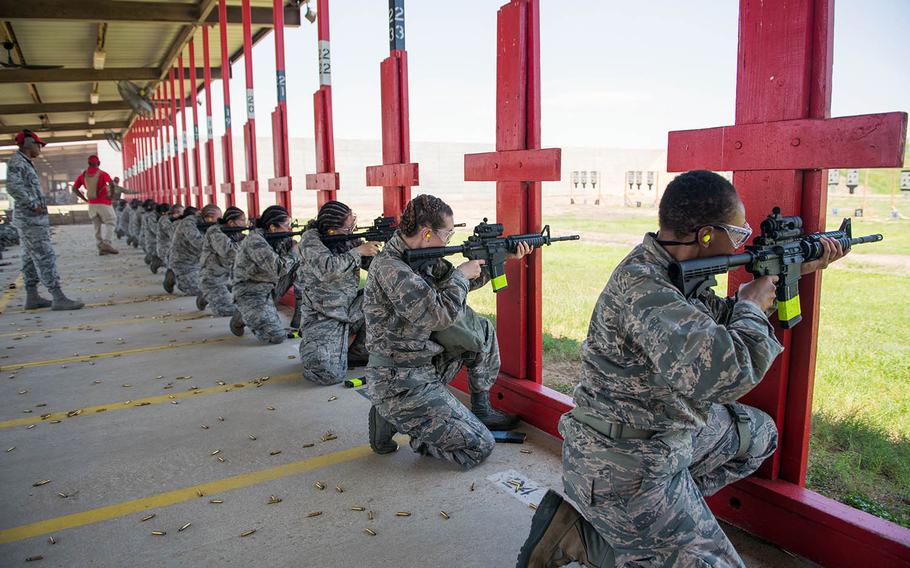U.S. Air Force trainees at Joint Base San Antonio-Medina Annex fire their M4 carbines during a weapons familiarization course on June 8, 2019.