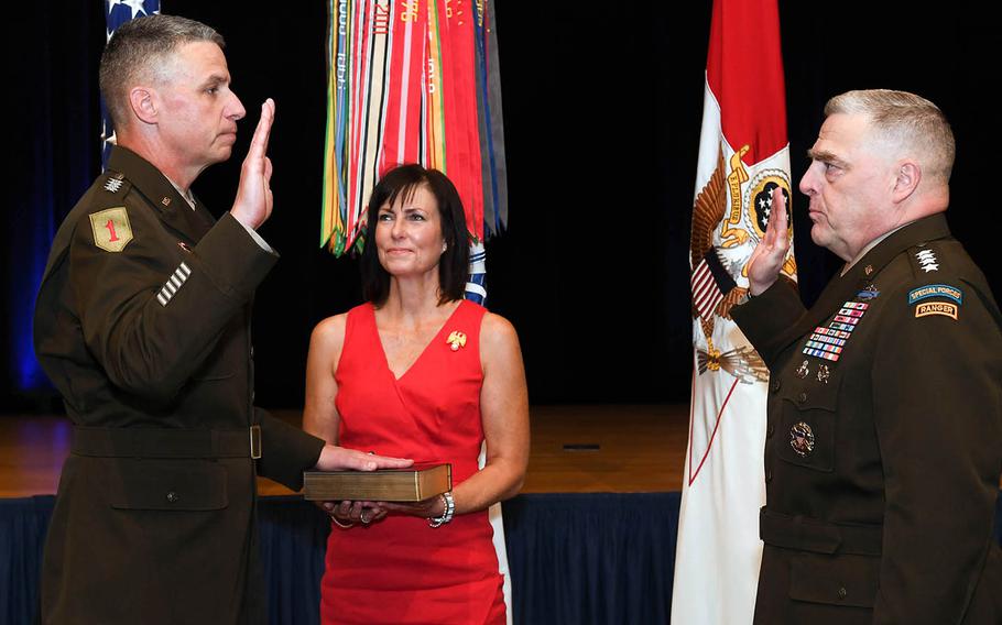 Gen. Joseph Martin, left, is sworn in as Army vice chief of staff by Army Chief of Staff Gen. Mark Milley during a ceremony at the Pentagon, Arlington, Va., as his wife, Leann Martin, watches on July 26, 2019.