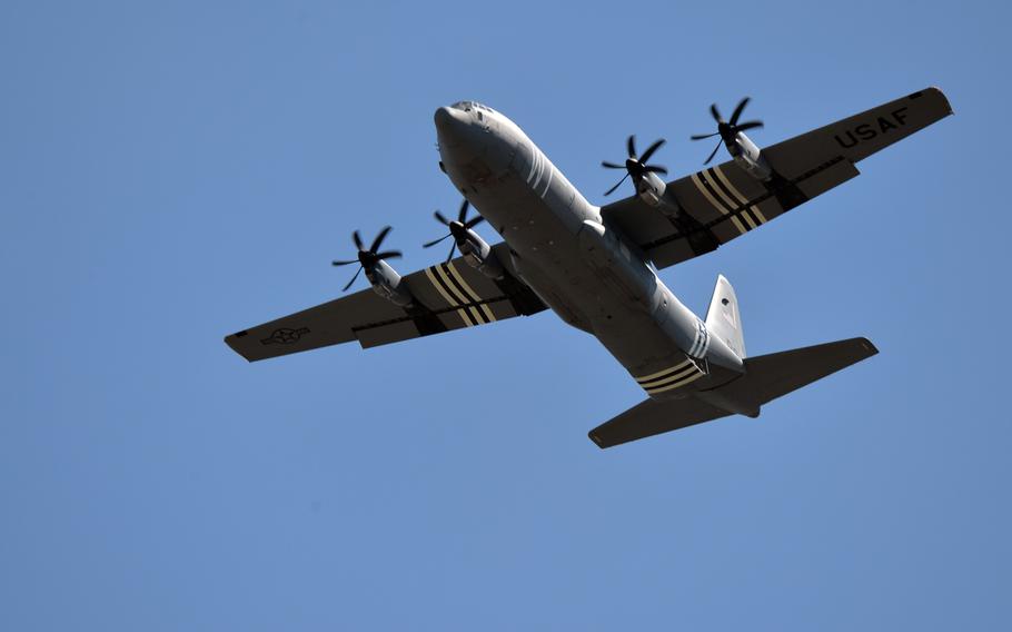 A C-130 Hercules flies over Ramstein Air Base, Germany, in July 2019. Nearly one-fourth of the Air Force's fleet of C-130s is being pulled for inspection after ''atypical'' cracks were found on the lower center wing joint during scheduled depot maintenance, Air Mobility Command announced late Wednesday.