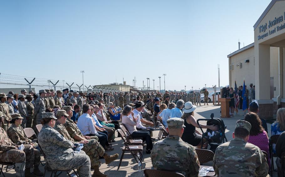 The Kidd family, friends and airmen of the 2nd Bomb Wing gather for the renaming of the Weapons Load Training facility at Barksdale Air Force Base, La., to the Kidd Weapons Load Training facility in honor of the late Tech. Sgt. Joshua L. Kidd Aug. 16, 2019.