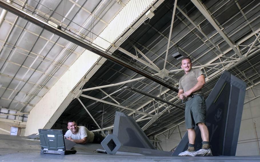 Airmen at three Air Force bases across the U.S. were authorized in July to wear approved shorts while working on the flight lines, like these airmen in an undated photo.