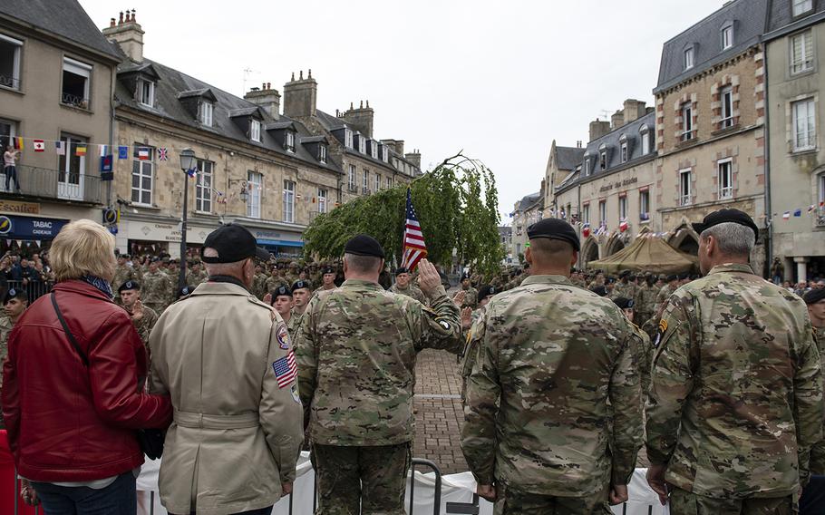 Army Chief of Staff Gen. Mark Milley renders the oath of enlistment to 21 soldiers during the 101st Airborne Division re-enlistment ceremony in Carentan, France, June 7, 2019, as part of the commemoration of the 75th anniversary of D-Day.