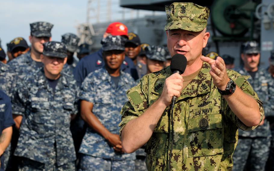 Then-Master Chief Petty Officer of the Navy Rick West holds an all-hands call at Naval Station Norfolk, Va. West is wearing the Navy working uniform type III during a test phase, while the sailors behind him wear the Type I uniform. That uniform, also known as a blueberry, will no longer be authorized for wear starting October 1, 2019.