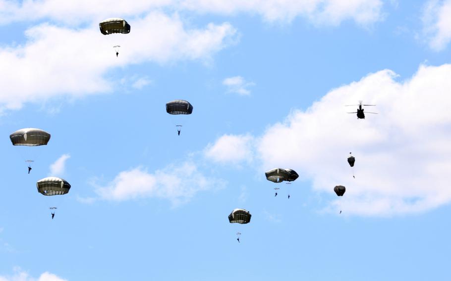 Fort Bragg Soldiers jump from a CH-47 Chinook with re-hydrated plasma to test product durability at Fort Bragg, N.C., Sept. 20, 2019.
