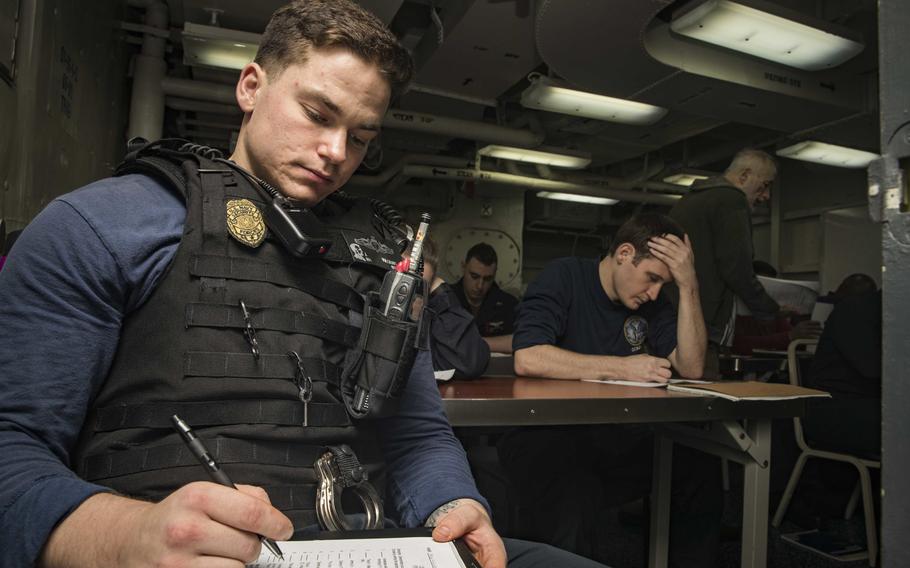 Seaman Justin Williams attends a Navy College Afloat Program for College Education class in a training classroom while underway on the USS Abraham Lincoln on July 19, 2019. The Navy announced on Sept. 30, 2019, that the instructor-led NPACE program is ending, with all funds being redirected to the tuition assistance program.