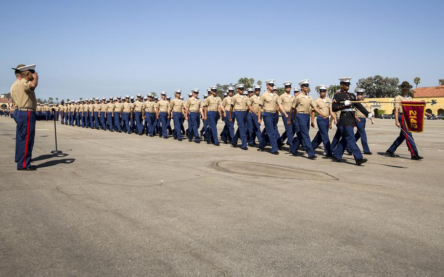 New Marines of Golf Company, 2nd Recruit Training Battalion, march in formation during a graduation ceremony at Marine Corps Recruit Depot, San Diego, Sept. 20, 2019.