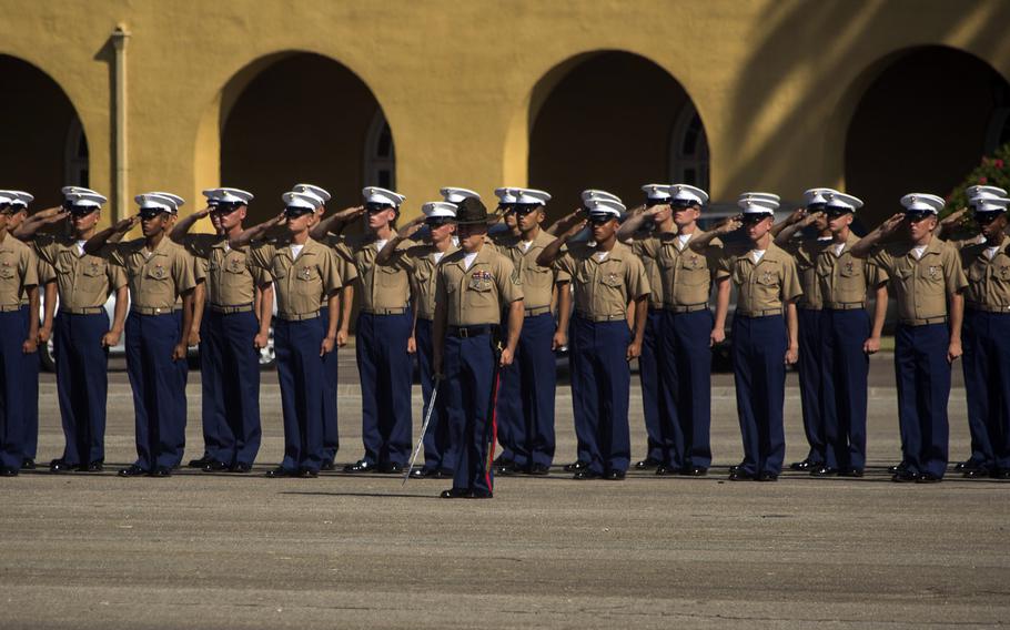 New Marines of Golf Company, 2nd Recruit Training Battalion, render salute during a graduation ceremony at Marine Corps Recruit Depot, San Diego, Sept. 20, 2019.
