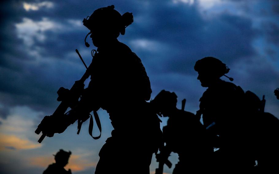 Green Berets assigned to 3rd Special Forces Group (Airborne) conduct urban movement training on July 18, 2019, at Fort Bragg, N.C. Troops must be able to operate when technology no longer works, which means being better at battlefield maneuvers and land navigation, according to a new Army special operations strategy document.